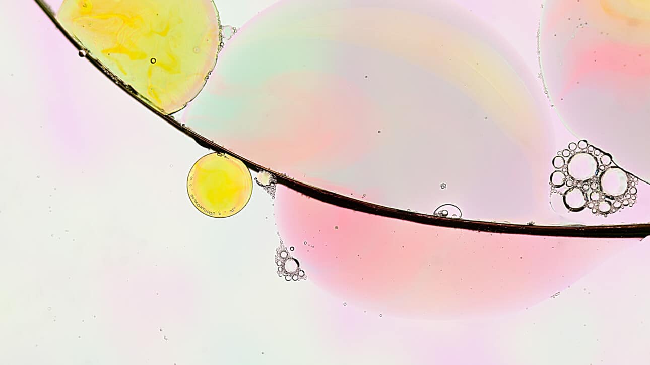 colorful bubbles seen on a microscope slide.