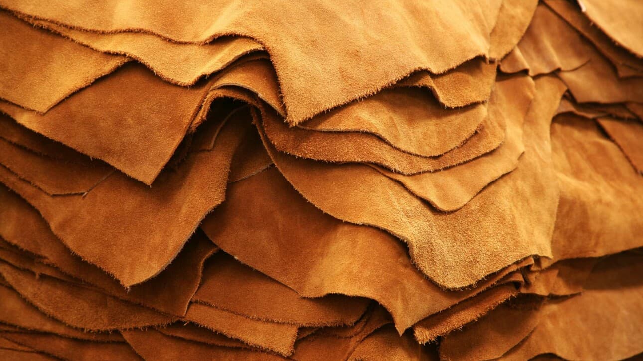 leather hides in a stack.